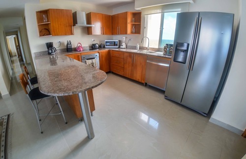 Zona Hotelera Norte Condo | Escape to this amazing Beachfront condo at Peninsula Grand Cozumel!